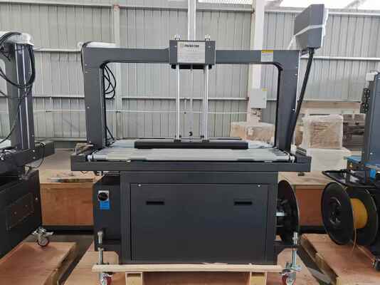 Qualità  Semi-Automatic 1200mm Carton Box Strapping Machine with One Year Warranty for Efficient Packing Fabbrica
